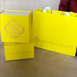 2 Kendra Scott gift boxes and a gift bag